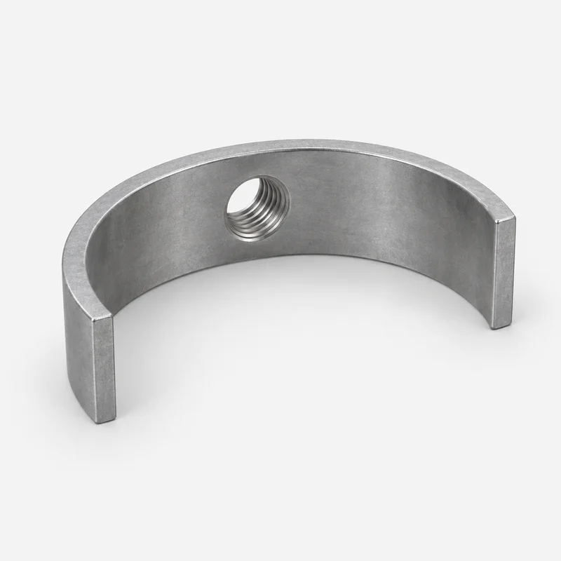 AI-generated generic semicircular band half moon nut with a threaded hole in the curved wall; not a supplied model