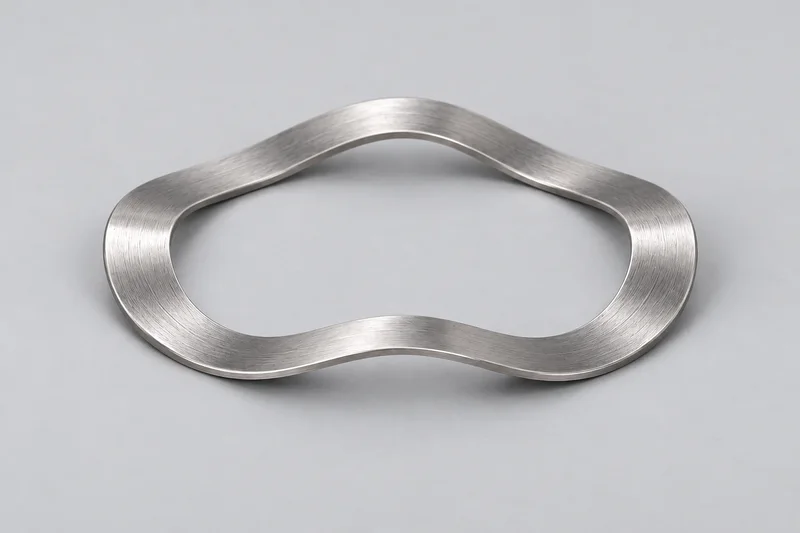 AI-rendered reference of one thin closed waved washer ring with axial peaks and valleys; not a supplied product or dimensioned drawing.